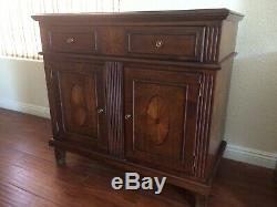 Dining table set with four chairs and one buffet cabinet