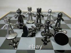 Modernist Buddy Chess Set Matt And Brushed Stainless Steel By Umbra+ Cabinet