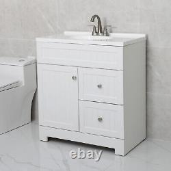 Ensemble de meuble-lavabo blanc de 30 pouces avec cabinet, vasque en résine et robinet en acier inoxydable.